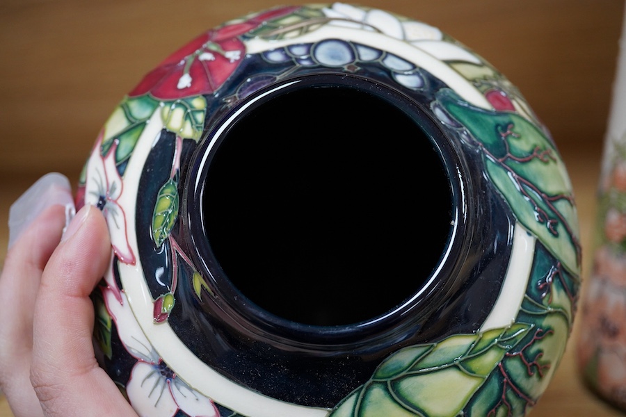 A Moorcroft ‘Nostalgia’ pattern vase together with a similar ‘Foxglove’ pattern ewer, 24.5cm. Condition - good, some crazing